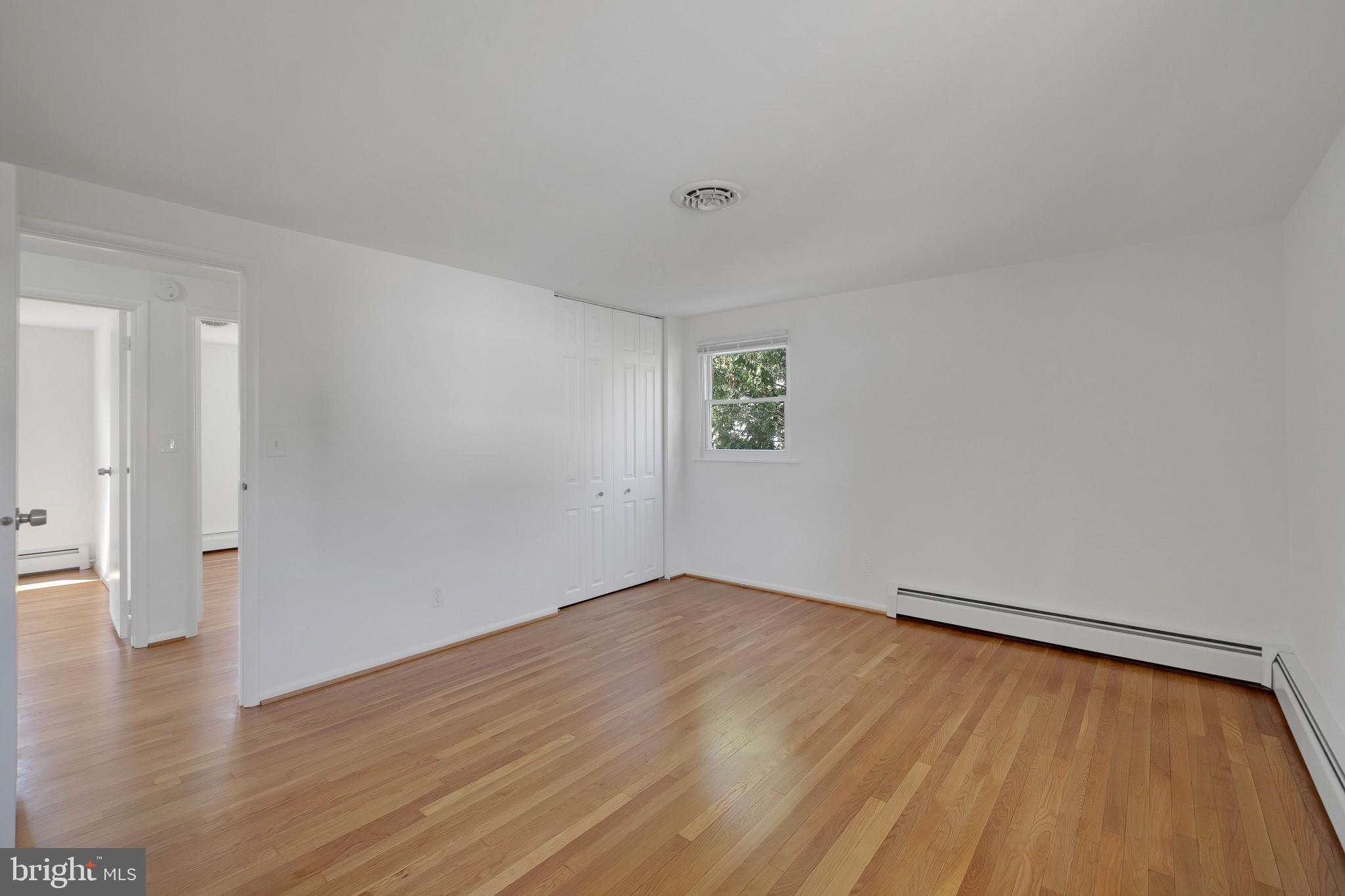 423 Bathurst Road Baltimore, MD 21228 - Photo 15 of 30 Master bedroom with refinished hardwood flooring