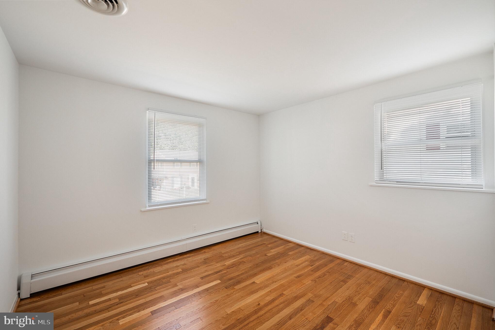 423 Bathurst Road Baltimore, MD 21228 - Photo 16 of 30 bedroom with refinished hardwood flooring