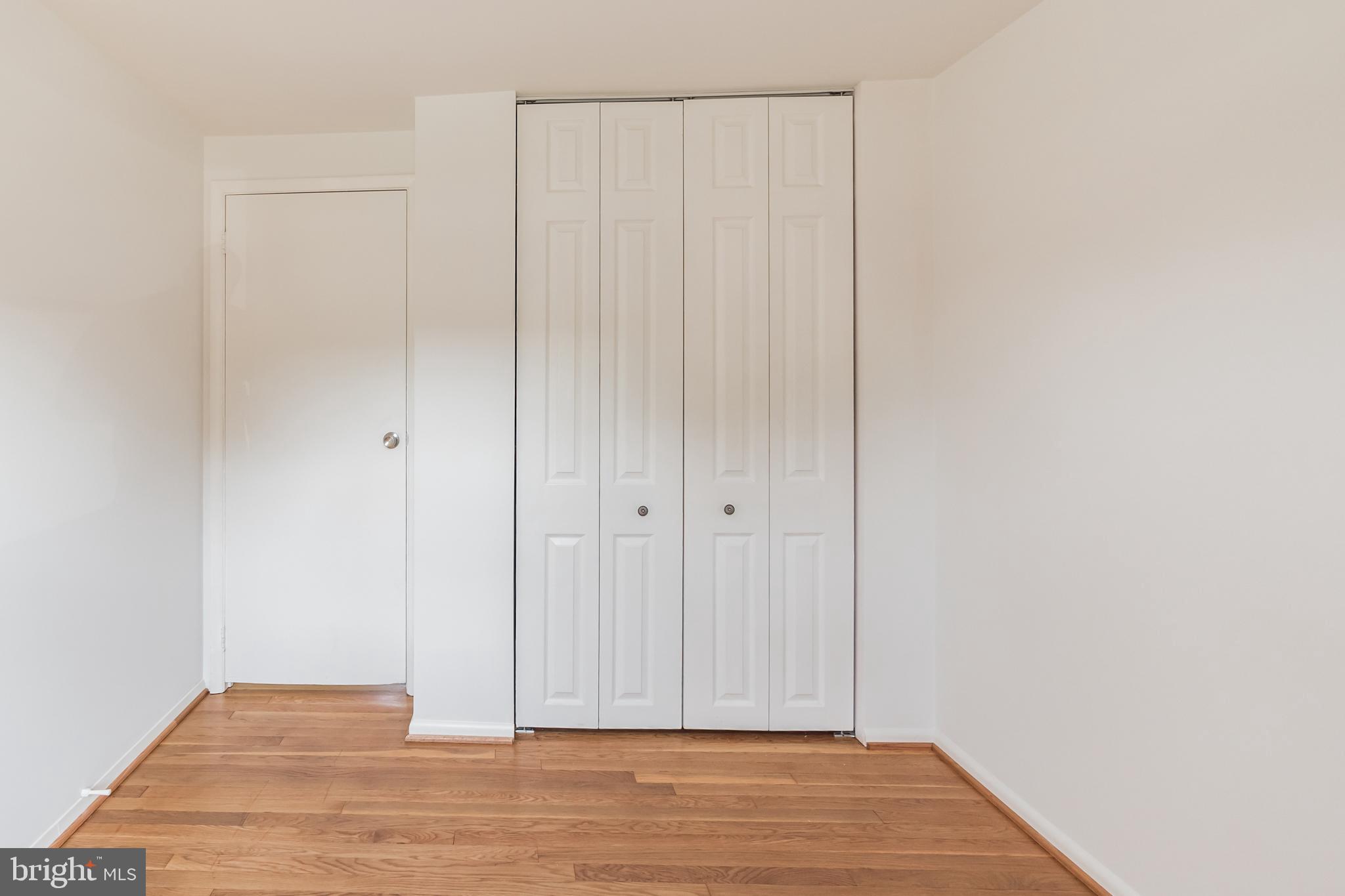 423 Bathurst Road Baltimore, MD 21228 - Photo 18 of 30 bedroom with refinished hardwood flooring