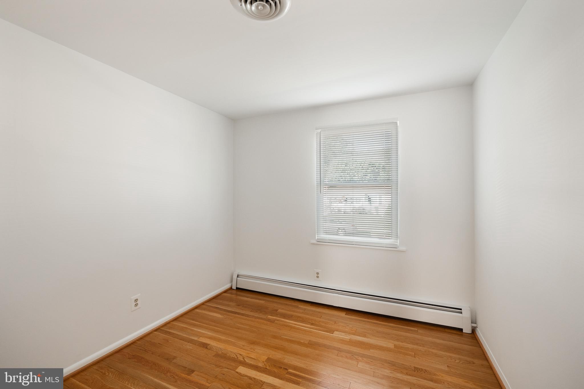 423 Bathurst Road Baltimore, MD 21228 - Photo 19 of 30 Bedroom with hardwood flooring