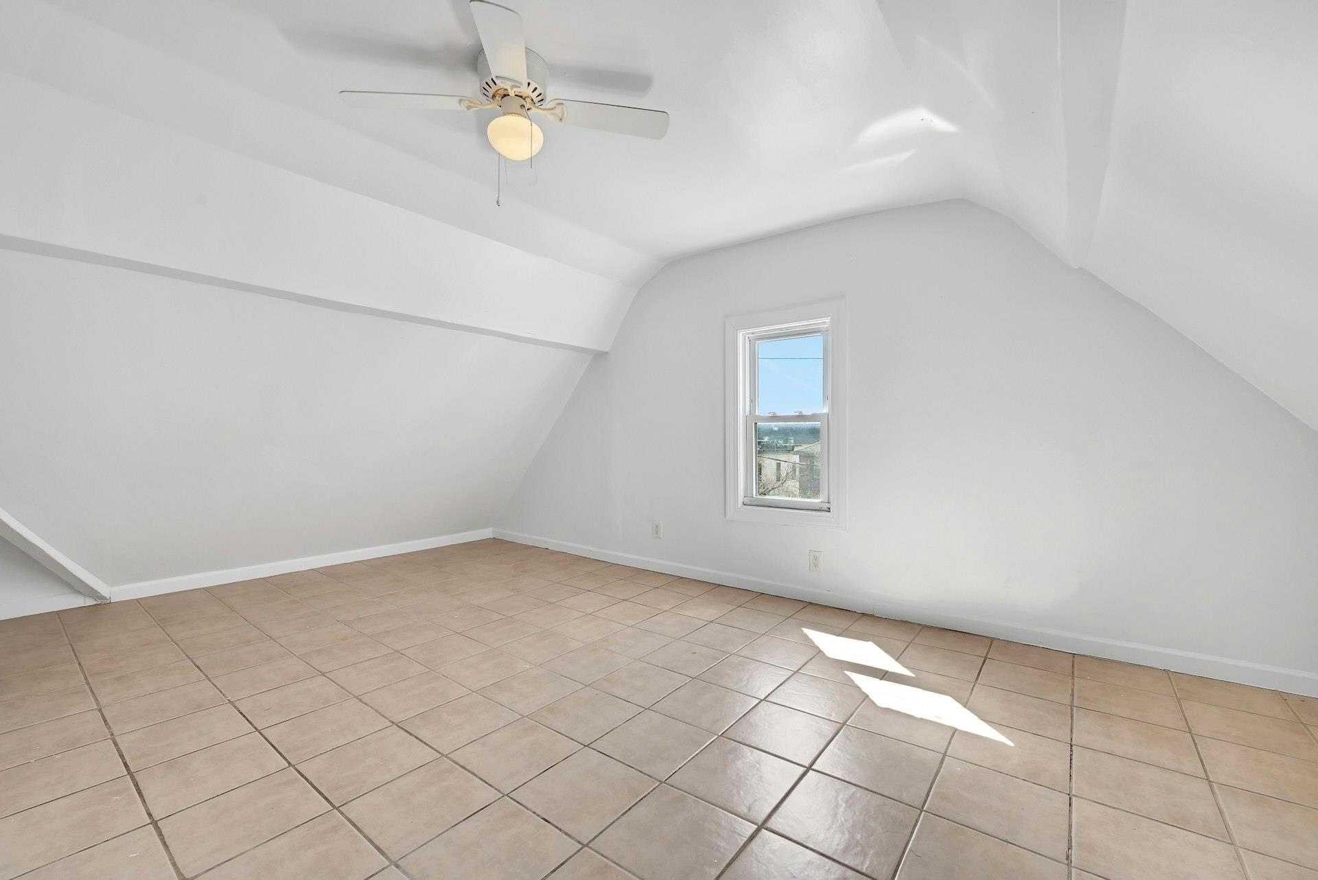 30 Columbia Terrace, Unit 2 Edgewater, NJ 07020 - Photo 14 of 25 an empty room with windows