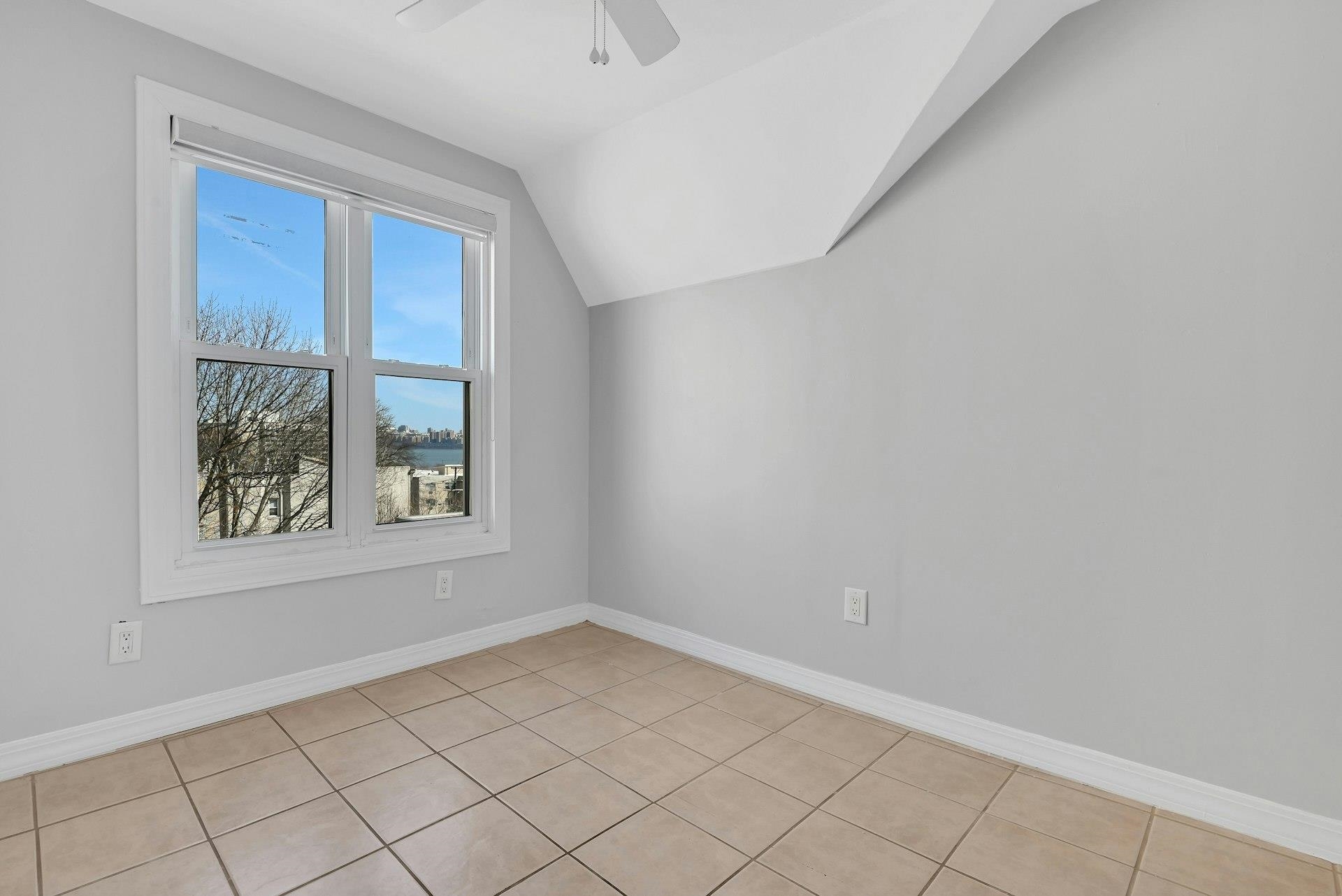 30 Columbia Terrace, Unit 2 Edgewater, NJ 07020 - Photo 19 of 25 a view of an empty room and window