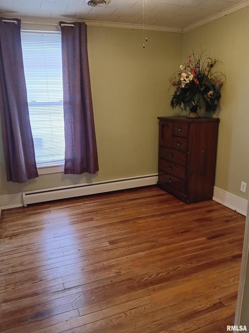 1935 Elm Street Murphysboro, IL 62966 - Photo 19 of 23 a view of a room with wooden floor and a window