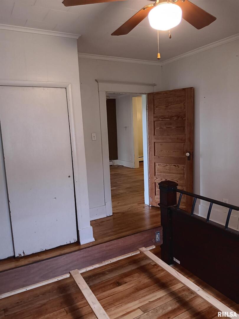 1935 Elm Street Murphysboro, IL 62966 - Photo 22 of 23 a view of a hallway with wooden floor