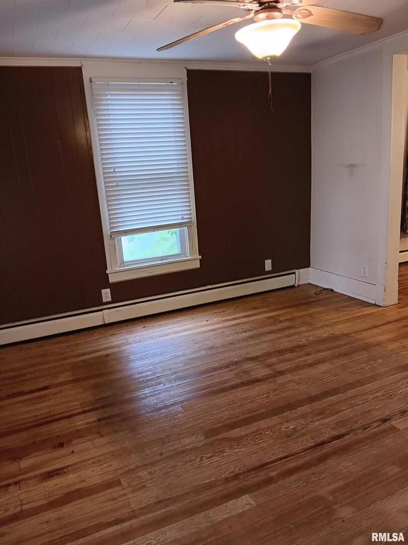 1935 Elm Street Murphysboro, IL 62966 - Photo 8 of 23 an empty room with wooden floor and windows