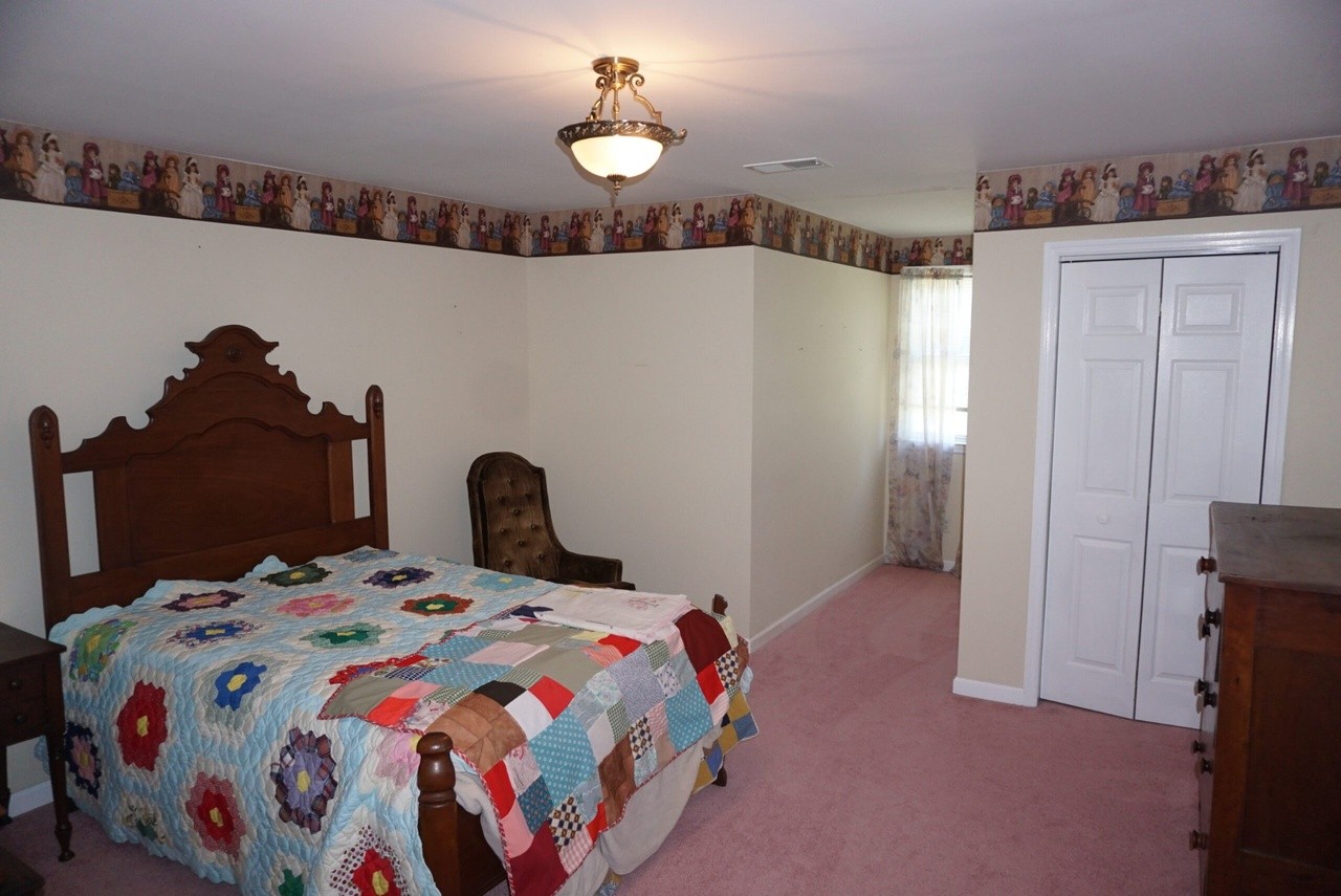 2384 Rocky Fork Road Nolensville, TN 37135 - Photo 16 of 21 a bedroom with bed and a window