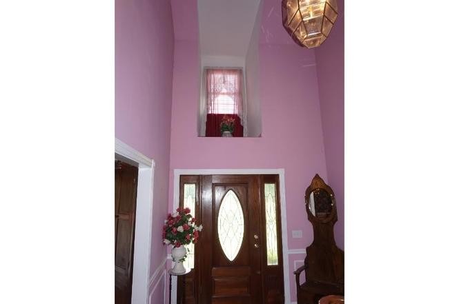 2384 Rocky Fork Road Nolensville, TN 37135 - Photo 9 of 21 a front view of a house with a floor to ceiling window