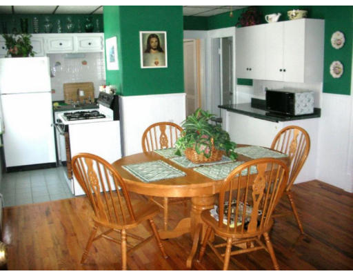 30-32 Exeter Street Lawrence, MA 01843 - Photo 2 of 8 a dining room with furniture and wooden floor