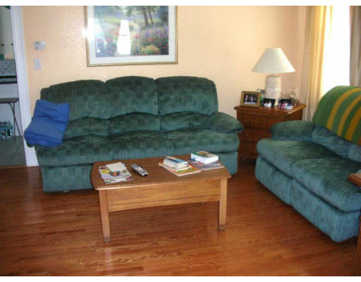 30-32 Exeter Street Lawrence, MA 01843 - Photo 5 of 8 a living room with furniture and a table