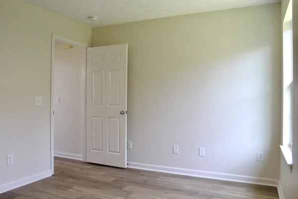 a view of hallway with livingroom view
