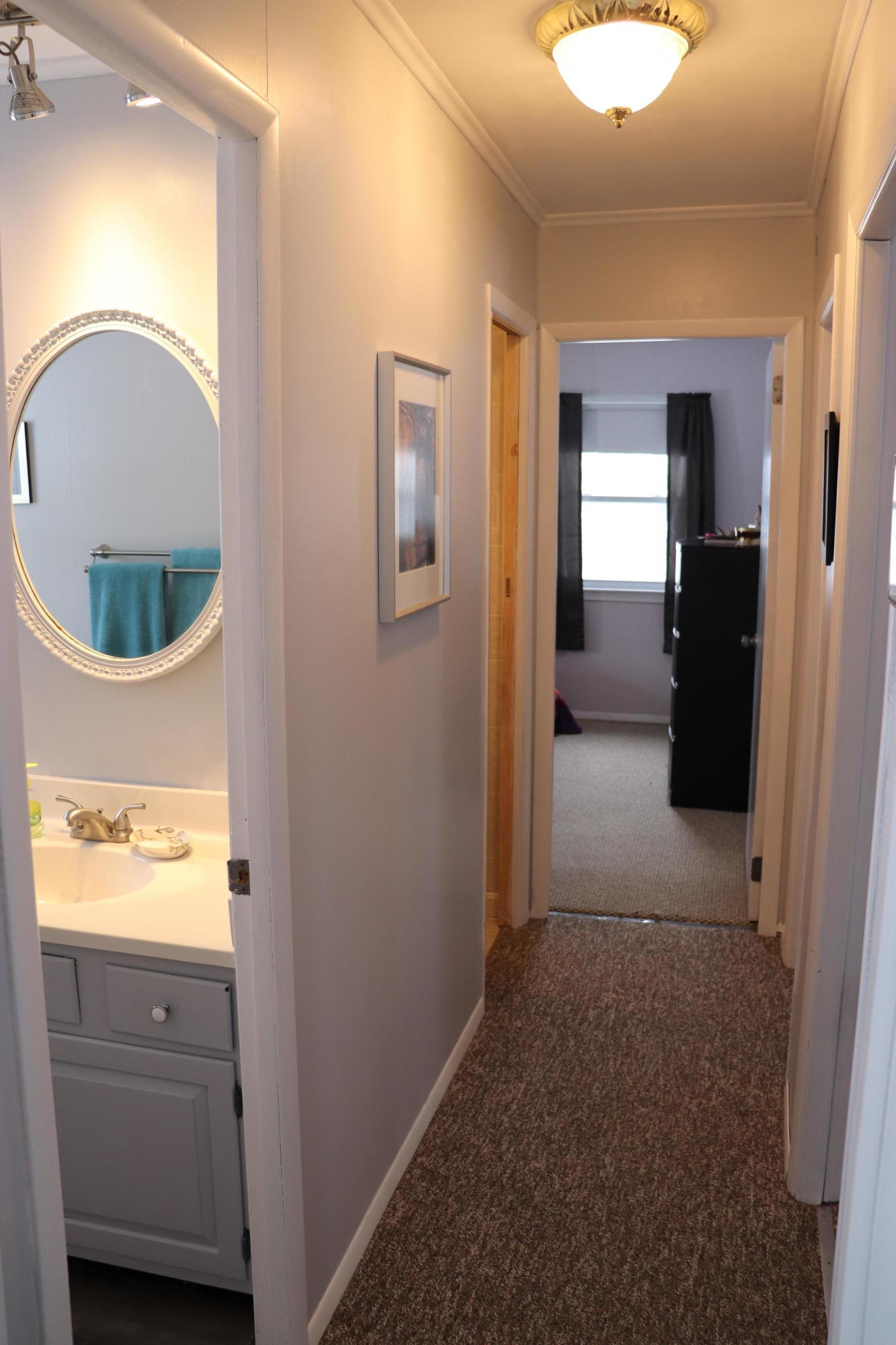 2 Gilbert Street Waterville, ME 04901 - Photo 14 of 30 14 hallway from LR leading to baths _ be