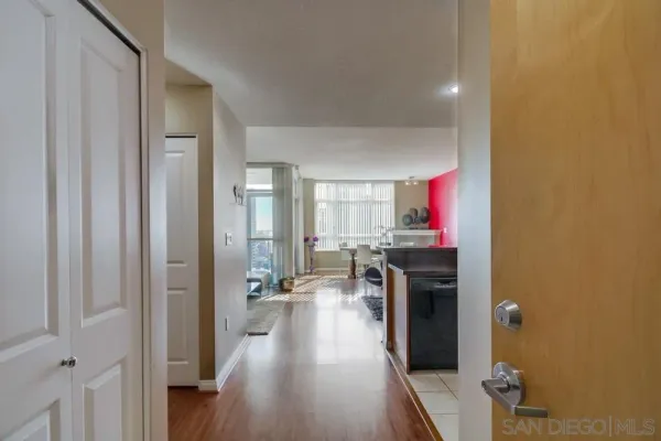 a kitchen with a sink and a stove top oven