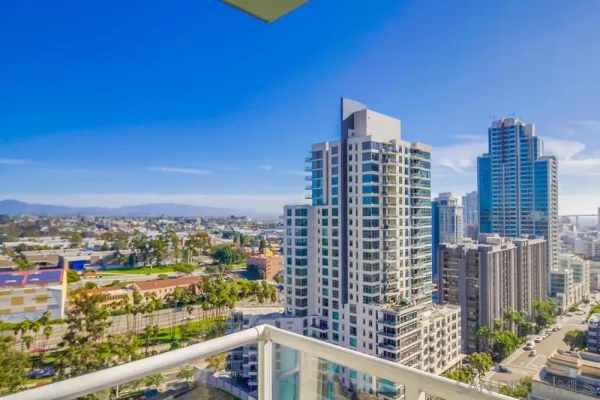 a view of a city with tall buildings