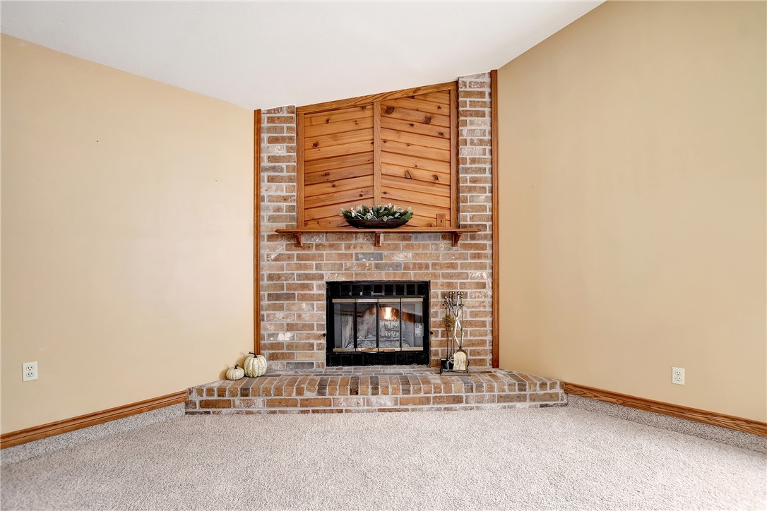 8846 Jackrabbit Lane Bryan, TX 77808 - Photo 16 of 48 a living room with furniture and a fireplace