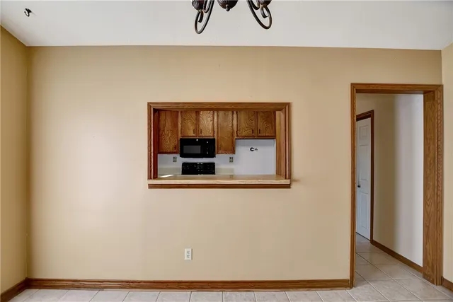 a kitchen with stainless steel appliances a sink stove and cabinets