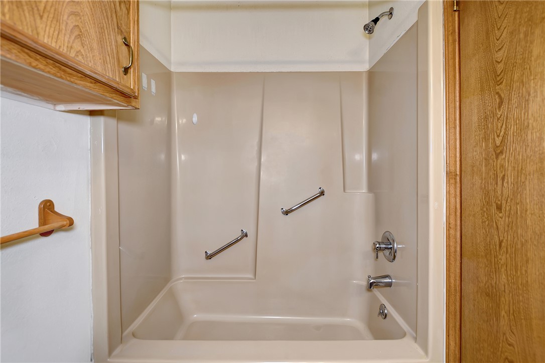 8846 Jackrabbit Lane Bryan, TX 77808 - Photo 32 of 48 a bathroom with a shower