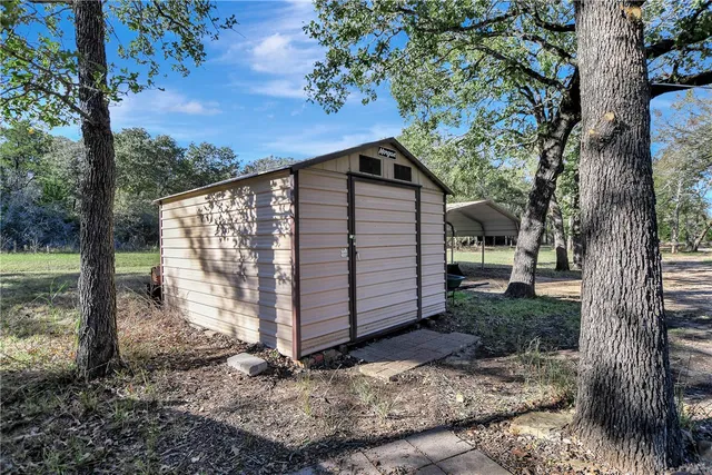 a view of lake with green space