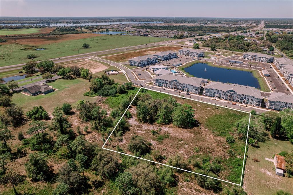 0 Angel Way St. Cloud, FL 34771 - Photo 3 of 6 a view of a city and lake view