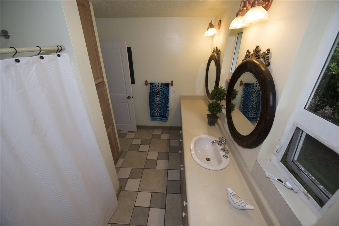 34 Door Of Faith Road Haiku, HI 96708 - Photo 7 of 8 a bathroom with a sink and a mirror
