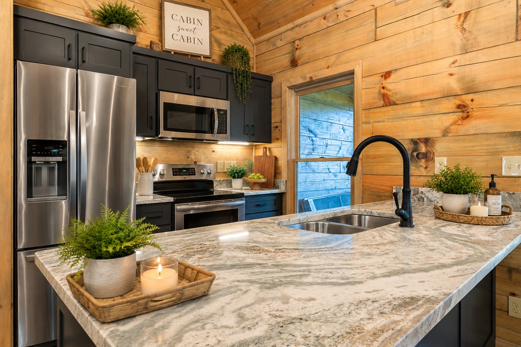 85 Moreland Trail Blue Ridge, GA 30513 - Photo 2 of 56 a kitchen with a sink and stainless steel appliances