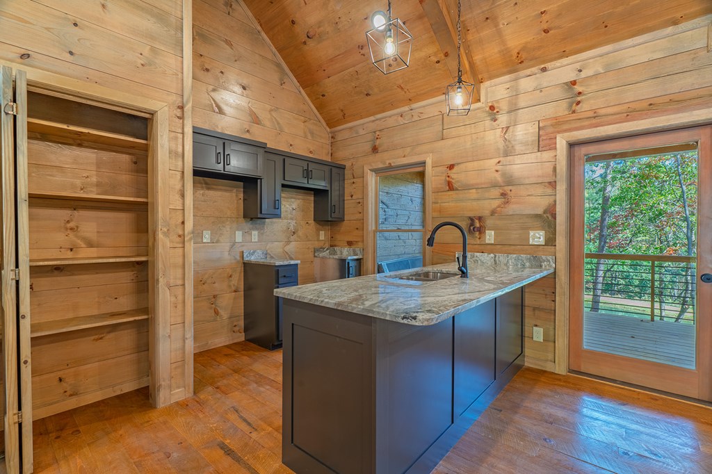 85 Moreland Trail Blue Ridge, GA 30513 - Photo 7 of 56 a kitchen with a sink and a stove