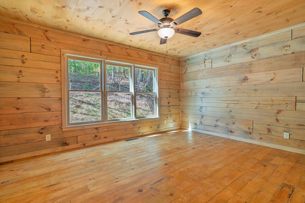 85 Moreland Trail Blue Ridge, GA 30513 - Photo 8 of 56 a view of an empty room with a window