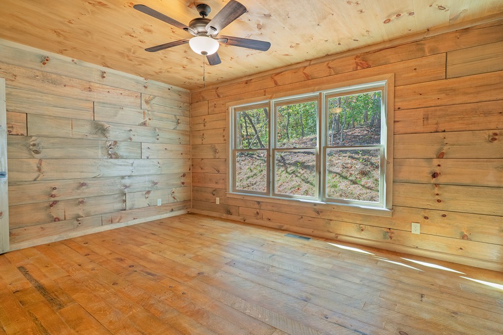 85 Moreland Trail Blue Ridge, GA 30513 - Photo 9 of 56 a view of an empty room with a window
