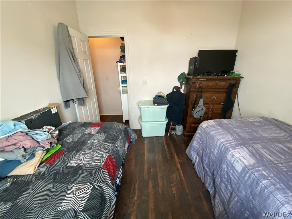 2111 Jamie Road Fort Mohave, AZ 86426 - Photo 29 of 50 a bedroom with a bed and flat screen tv