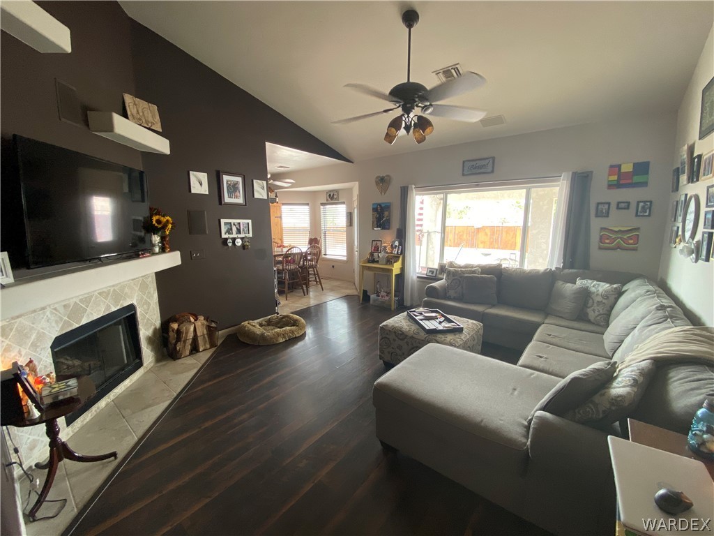 2111 Jamie Road Fort Mohave, AZ 86426 - Photo 8 of 50 a living room with furniture fireplace and a flat screen tv