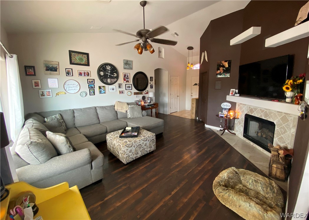 2111 Jamie Road Fort Mohave, AZ 86426 - Photo 10 of 50 a living room with furniture a flat screen tv and a fireplace