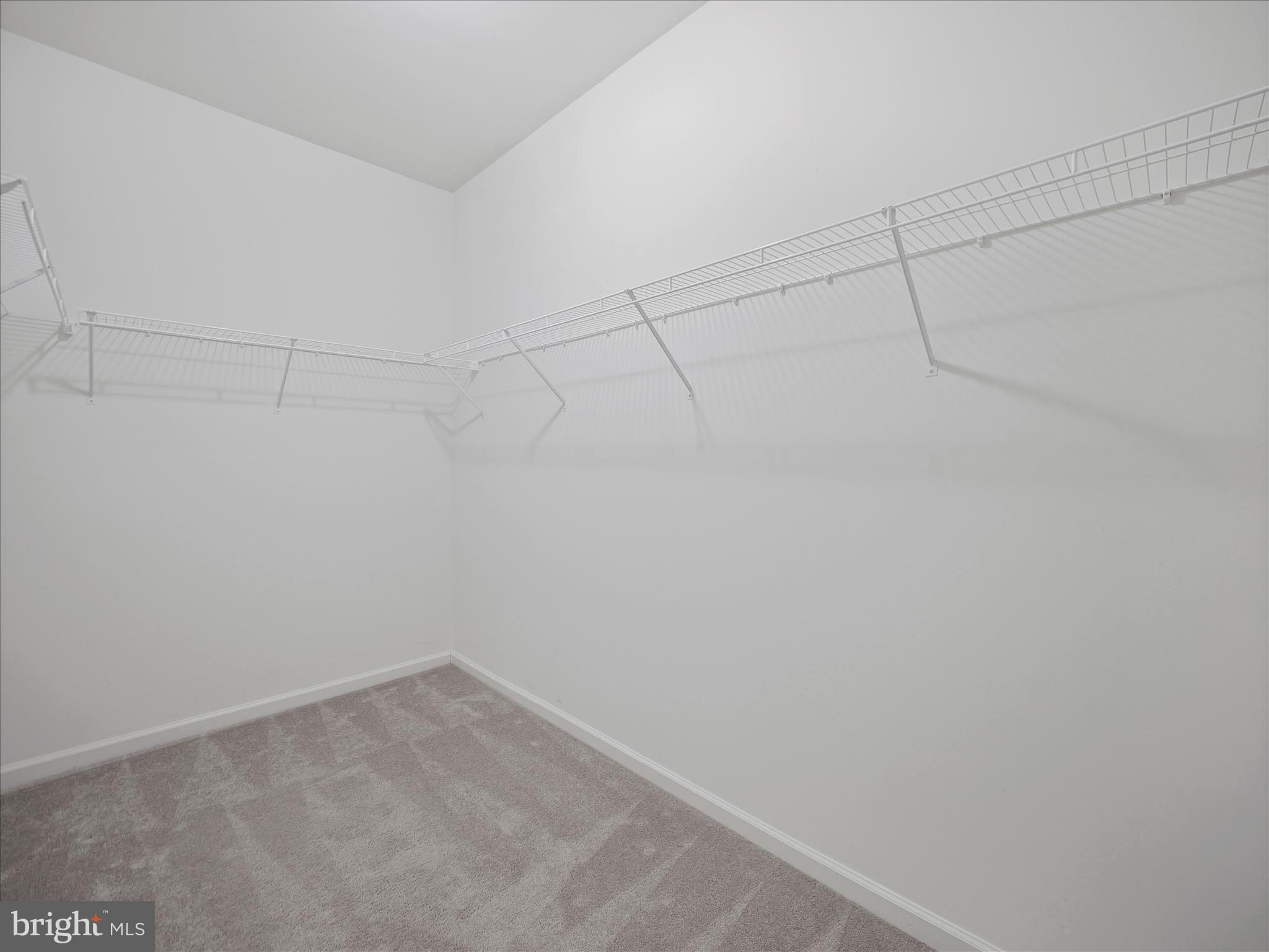 10227 Rashti Court Hagerstown, MD 21740 - Photo 23 of 36 a view of a room with racks on the wall