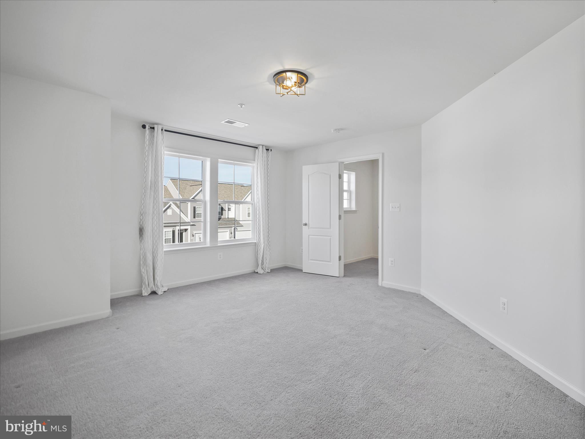 10227 Rashti Court Hagerstown, MD 21740 - Photo 30 of 36 an empty room with windows