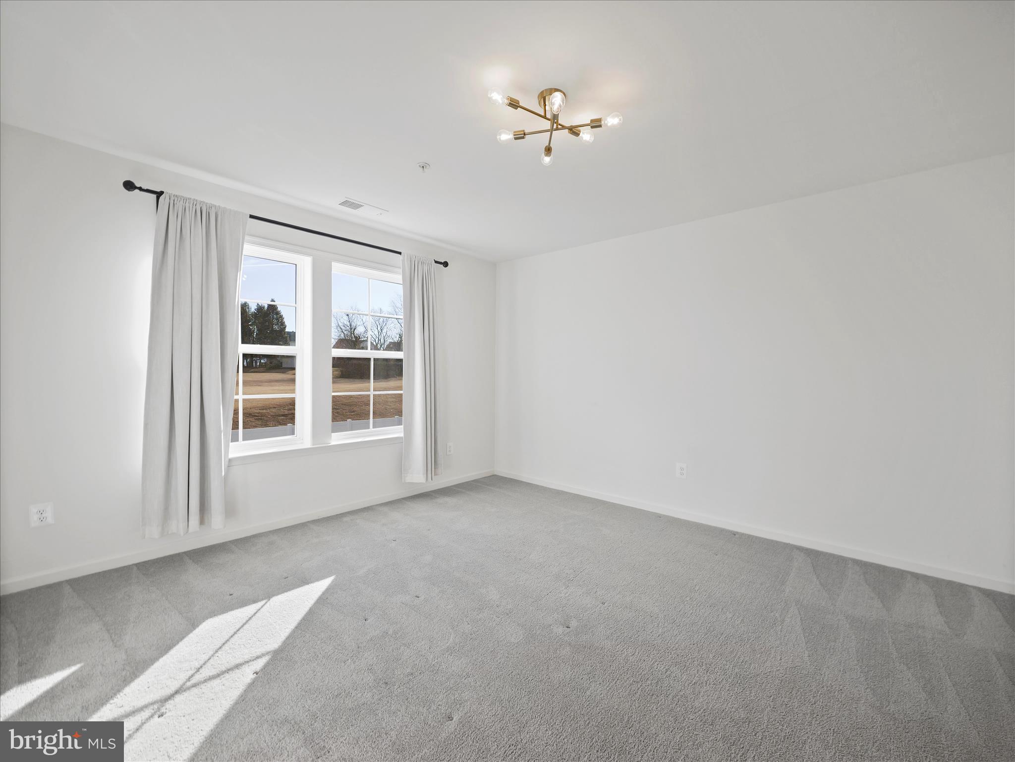 10227 Rashti Court Hagerstown, MD 21740 - Photo 33 of 36 a view of empty room with windows