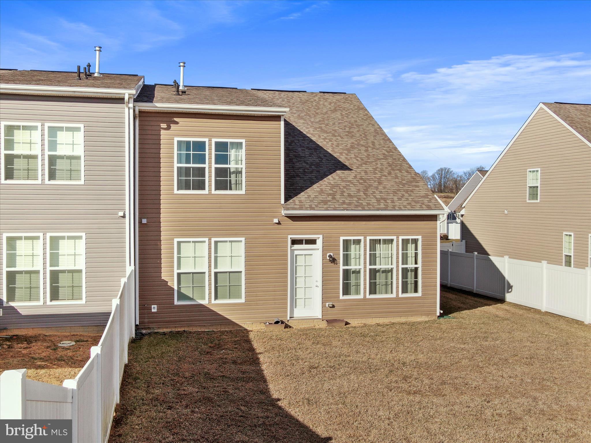 10227 Rashti Court Hagerstown, MD 21740 - Photo 9 of 36 a front view of a house with a yard