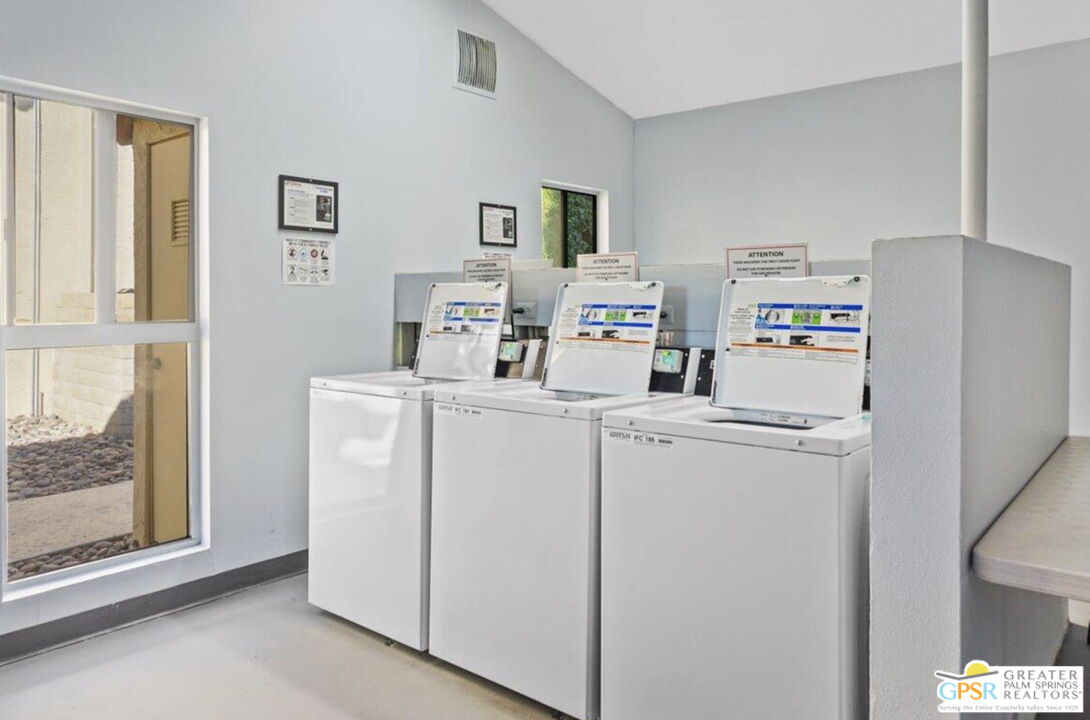 1421 North Sunrise Way, Unit 34 Palm Springs, CA 92262 - Photo 32 of 34 a room with storage and utility