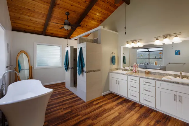 a kitchen with sink cabinets and refrigerator