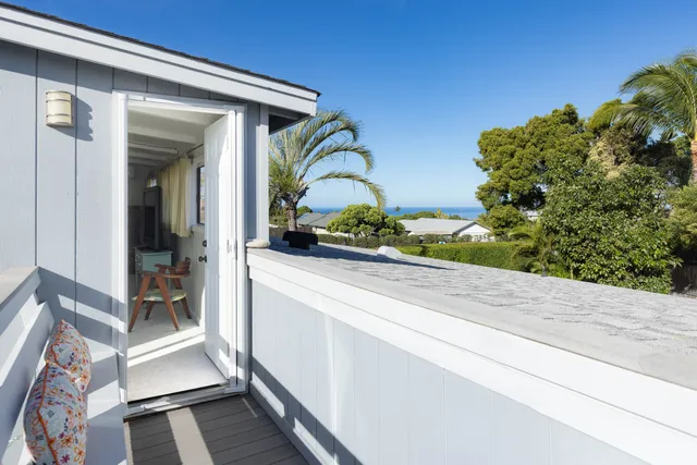 a front view of a house with a porch
