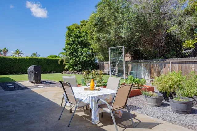 a view of a tables and chairs in patio