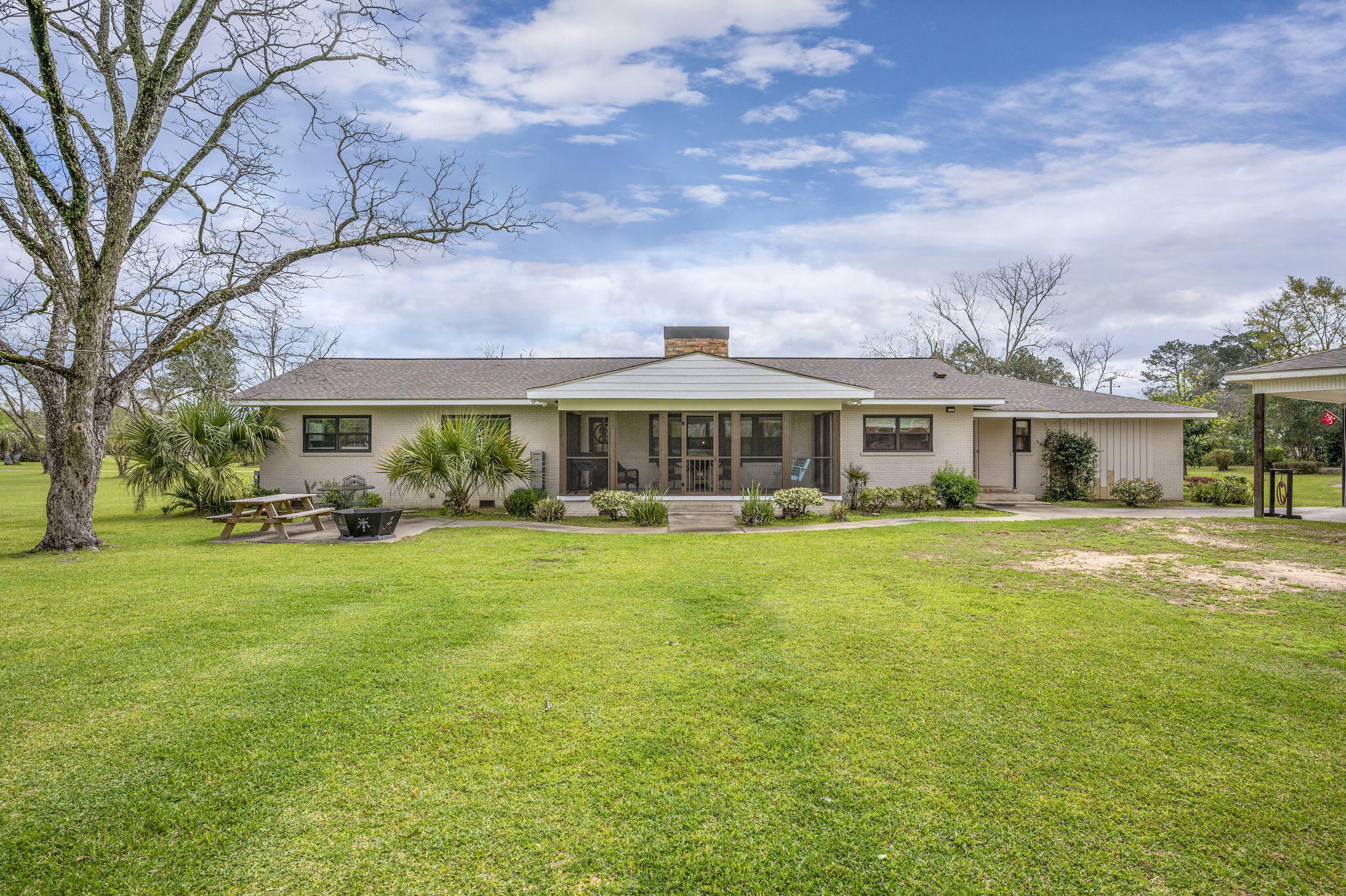 2231 Caton Road Florala, AL 36442 - Photo 54 of 65 a front view of house with yard barbeque and outdoor seating