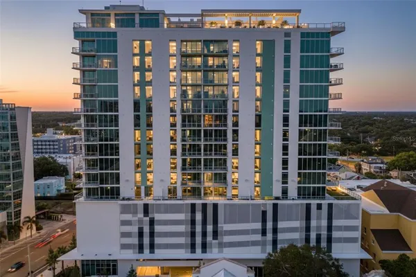 a front view of a building with glass windows