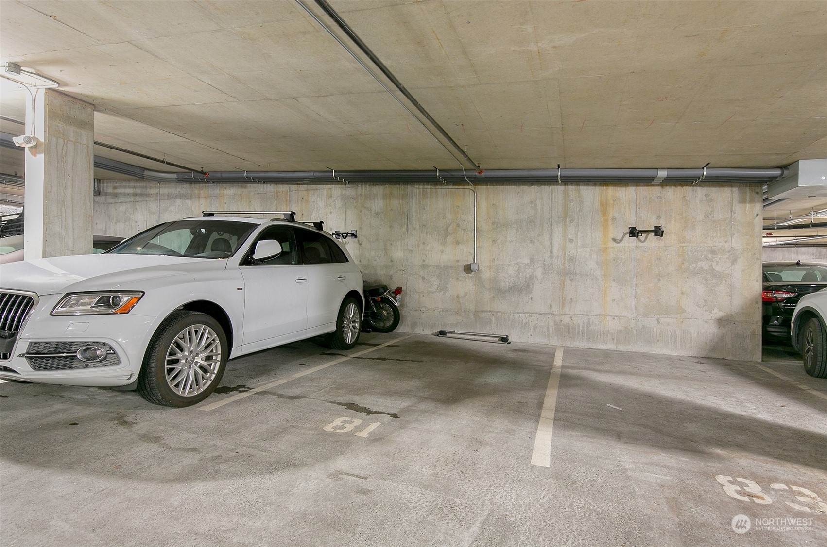 5440 Leary Avenue Northwest, Unit 417 Seattle, WA 98107 - Photo 17 of 21 a car parked in a garage