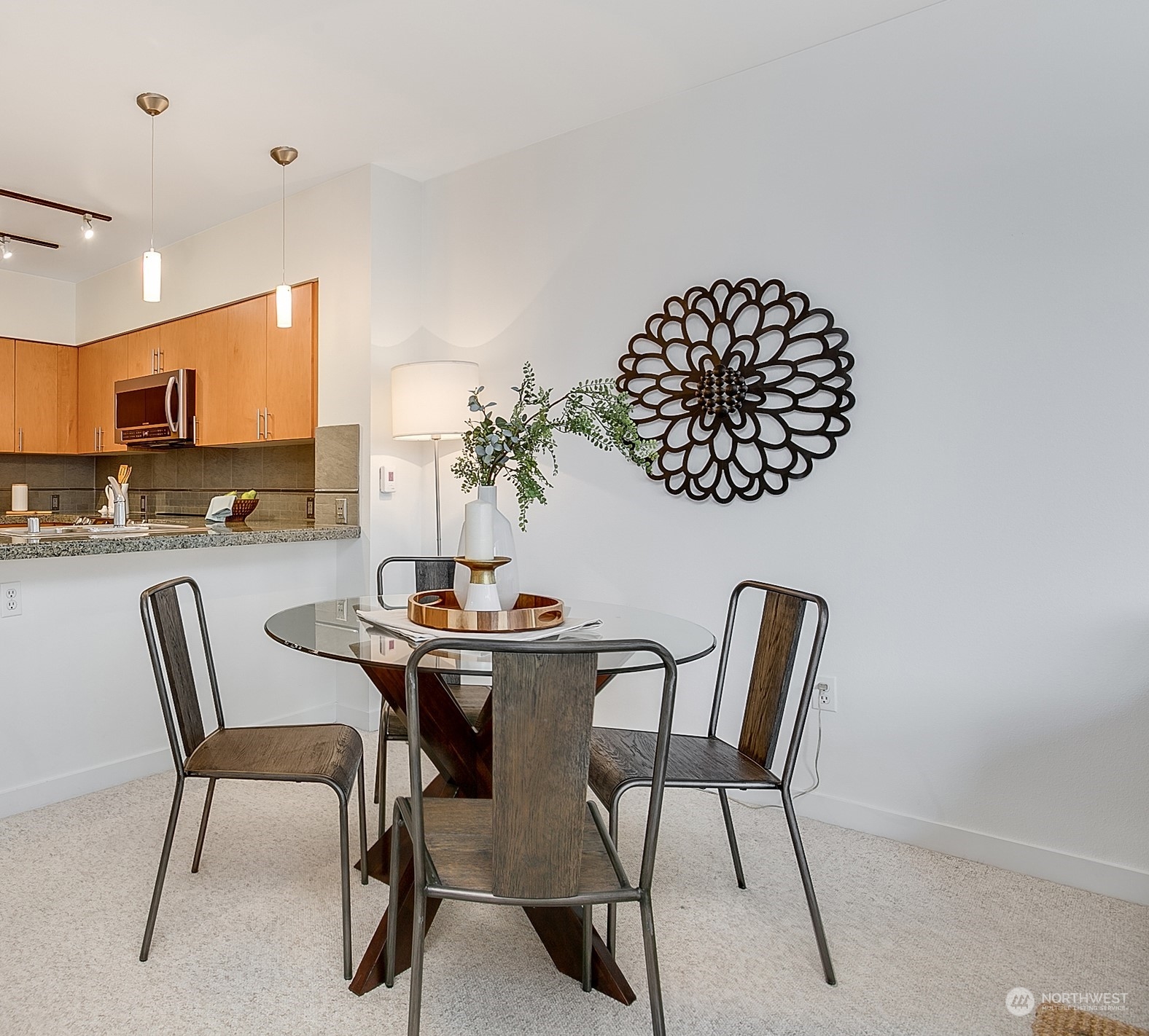 5440 Leary Avenue Northwest, Unit 417 Seattle, WA 98107 - Photo 7 of 21 a view of a dining room with furniture