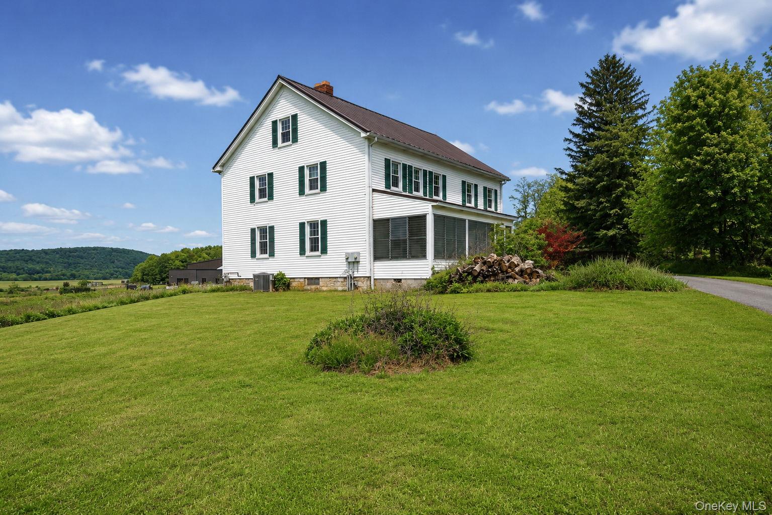340 Dunn Road Montgomery, NY 12549 - Photo 32 of 34 Side view of the home with mountain view