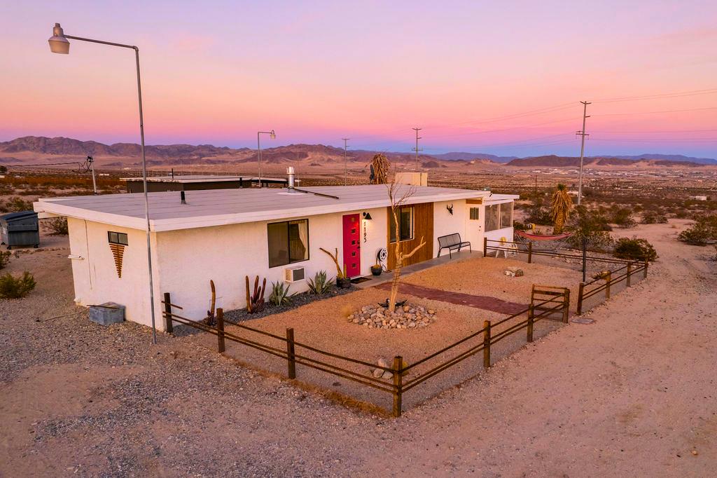 1195 Canyon Road Twentynine Palms, CA 92277 - Photo 1 of 25 a view of a terrace with sitting area