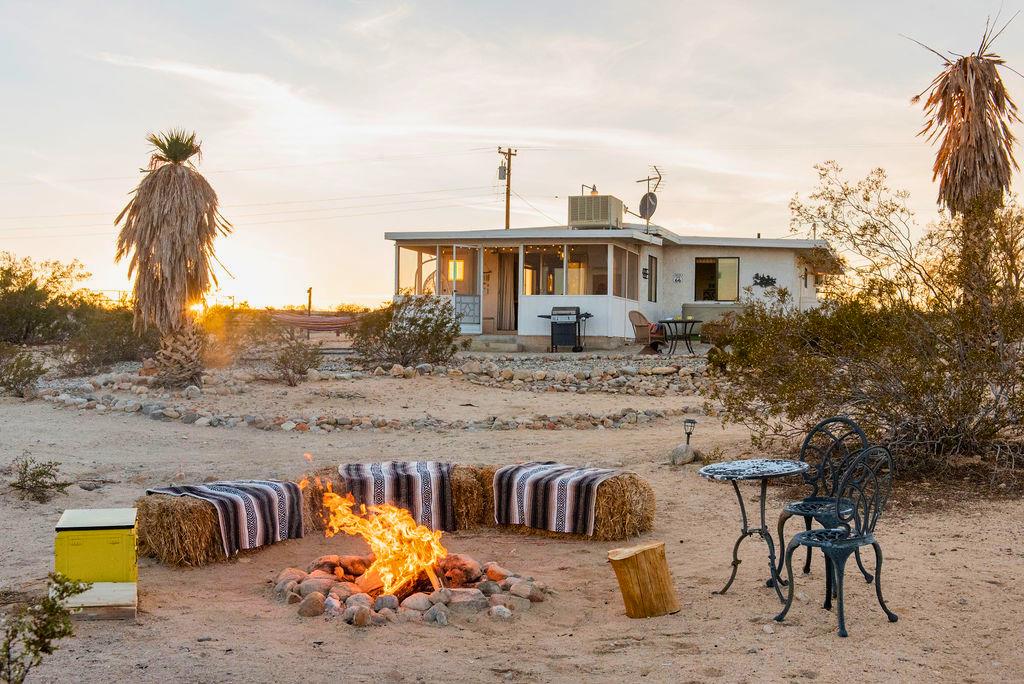 1195 Canyon Road Twentynine Palms, CA 92277 - Photo 5 of 25 a view of a house with backyard and furniture