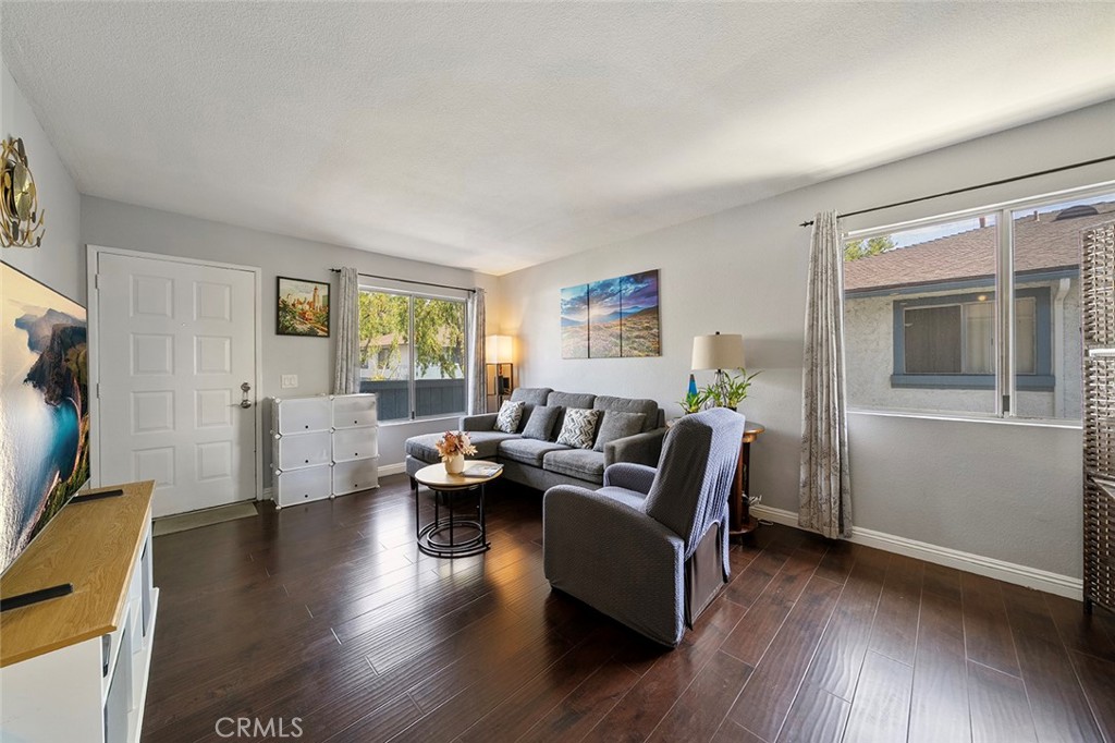 871 West 13th Street, Unit 4 Azusa, CA 91702 - Photo 5 of 22 a living room with furniture window and wooden floor