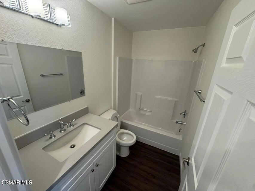 1850 Buyers Street, Unit 203 Simi Valley, CA 93063 - Photo 11 of 15 a bathroom with a double vanity sink toilet and shower