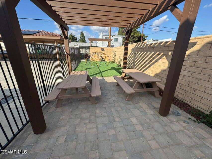 1850 Buyers Street, Unit 203 Simi Valley, CA 93063 - Photo 14 of 15 a building outdoor space with seating