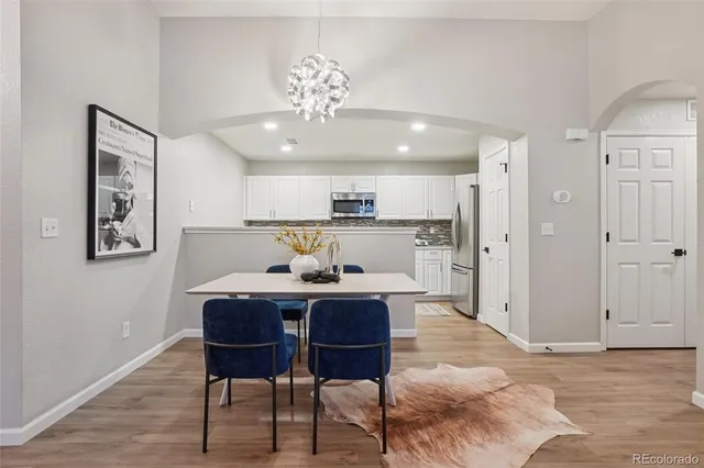 a view of a dining room with furniture