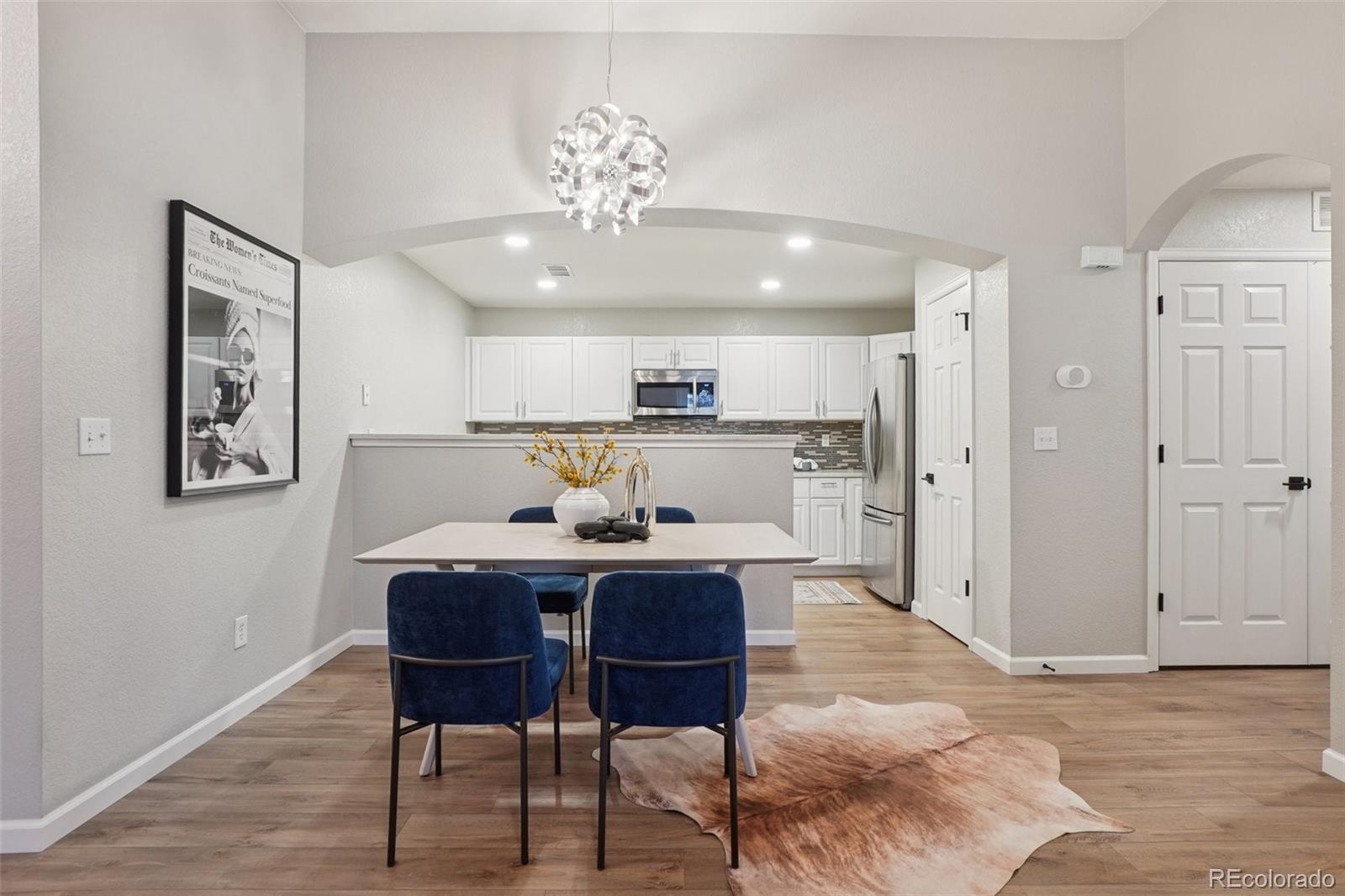 4271 South Blackhawk Circle, Unit 2C Aurora, CO 80014 - Photo 12 of 45 a view of a dining room with furniture